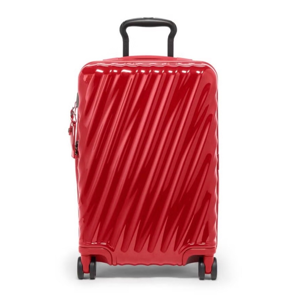 Tumi authentic International Expandable 4 Wheeled Carry-On